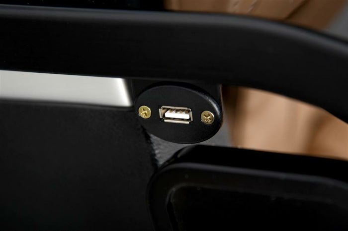 USB Charger Conveniently located beside the backrest to recharge devices